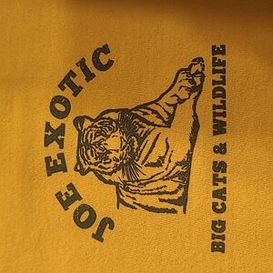 Tee featuring Joe Exotic, also known as the "Tiger King,"